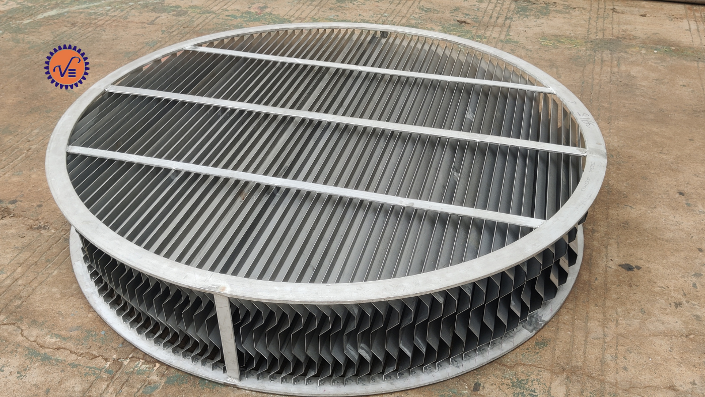Circular vane separator used in chemical and petrochemical industries for gas-liquid separation, featuring multiple vertical vanes inside a metallic frame.